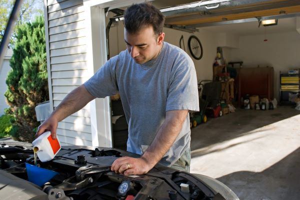 Why You Should Hire Professional Help for Your Garage Door Repairs